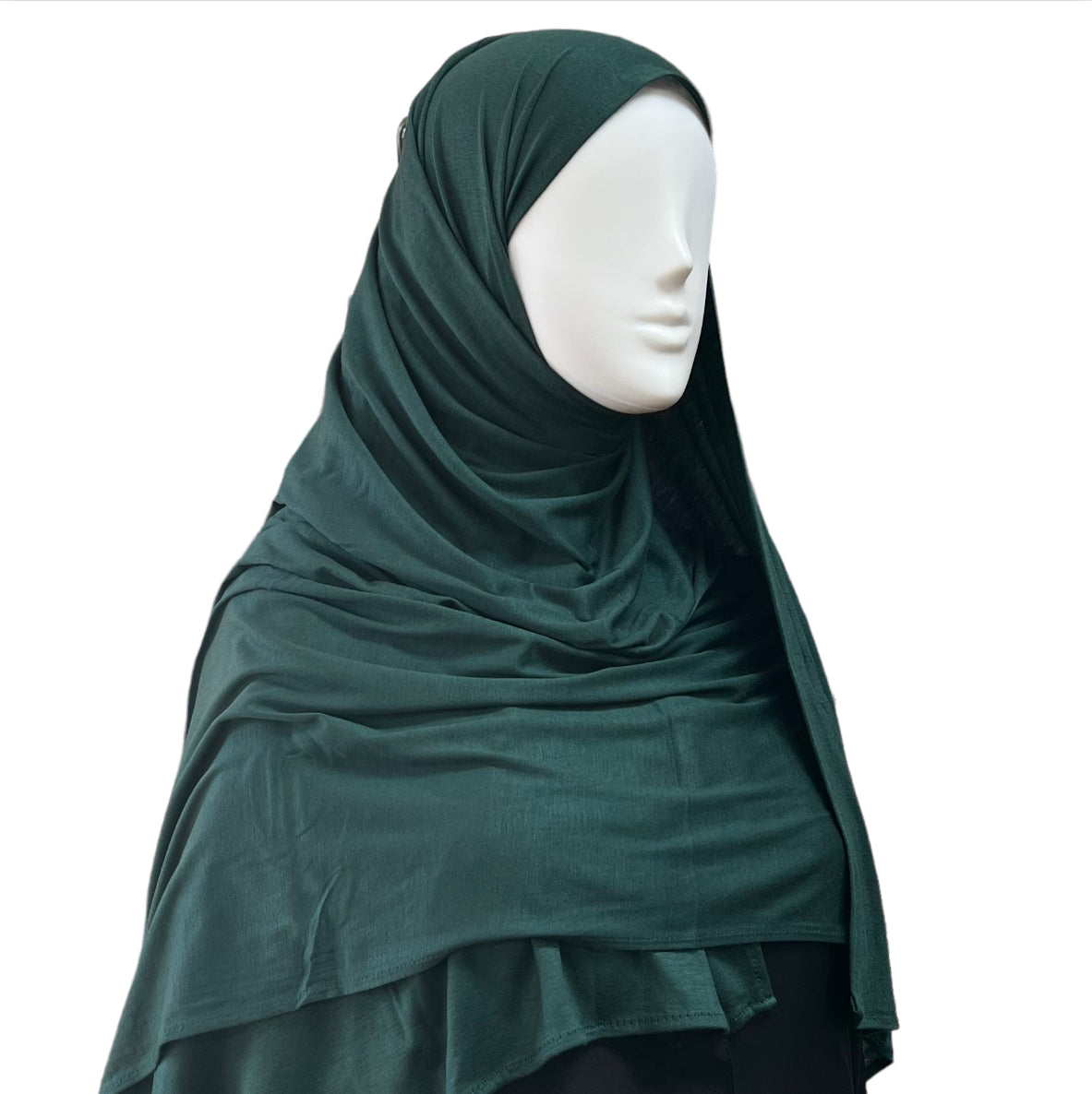 Buttery soft Large Jersey Hijab styled for everyday wear in emerald green for muslim women and girls