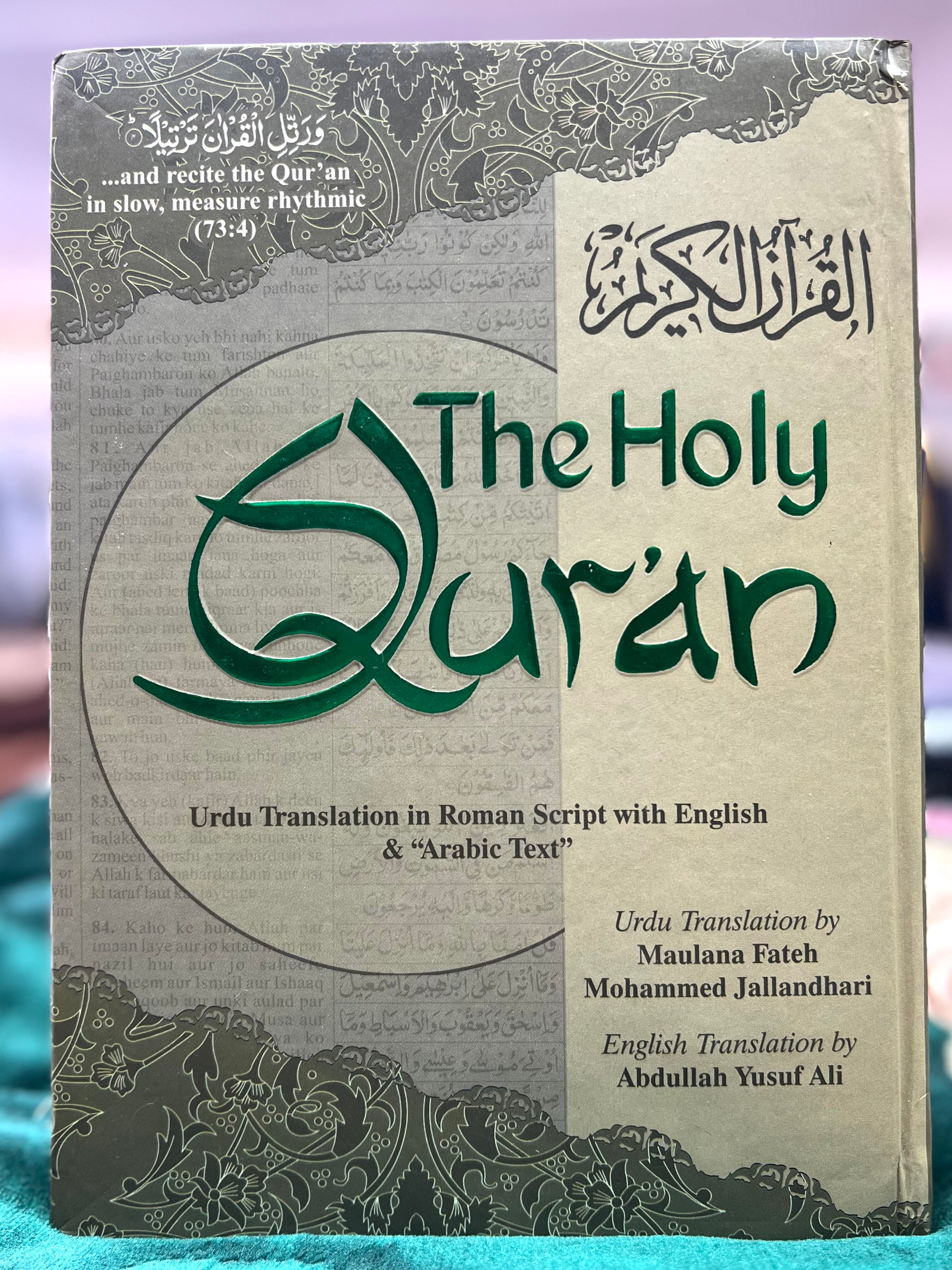 The Holy Quran with Urdu Translation in Roman Script, English Translation, & Arabic Text